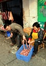 Pengzhou, China: Butchers with Homemade Sausages