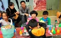 Pengzhou, China: Children Painting Figurines