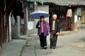 Pengzhou, China: Elderly Couple on Hua Lu Street
