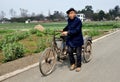 Pengzhou,China: Farmer with Bicycle Cart