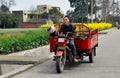 Pengzhou, China: Farmer Driving Motorcycle Cart