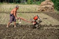 Pengzhou, China: Farmer Plowing Field