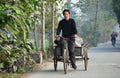 Pengzhou, China: Farmer Riding Bicycle Cart