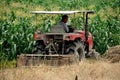 Pengzhou, China: Farmer Riding Tractor