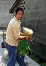 Pengzhou, China: Farmer with Spring Onions