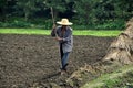 Pengzhou, China: Farmer Working His Field Royalty Free Stock Photo