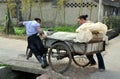 Pengzhou, China: Farmers Pushing Cart