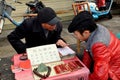 Pengzhou, China: Fortune Teller in Long Xing Square