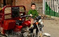 Pengzhou, China: Little Boy on Motorcyle Royalty Free Stock Photo