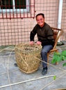 Pengzhou, China: Man Making Wicker Basket