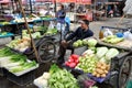 Pengzhou, China: Man Selling Vegetables