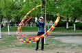 Pengzhou, China: Man Spinning Top