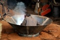 Pengzhou, China: Man Welding Wok Royalty Free Stock Photo