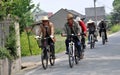 Pengzhou, China: Men Biking on Country Road