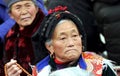 Pengzhou, China: Old Woman in Qiang Clothing Royalty Free Stock Photo