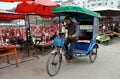 Pengzhou, China: Pedicab at Marketplace