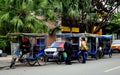 Pengzhou, China: Pedicab Taxis Waiting for Fares