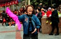 Pengzhou, China: Singing & Dancing Woman Royalty Free Stock Photo