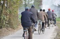 Pengzhou, China: Six Men on Bicycles