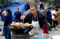 Pengzhou, China: Street Festival Food Vendor