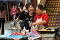 Pengzhou, China: Street Vendors Selling Food