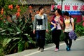 Pengzhou, China: Three Teens Walking on Road