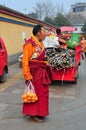 Pengzhou, China: Tibet Monk with Oranges