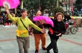 Pengzhou, China: Trio of Singing Women