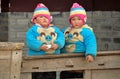 Pengzhou, China: Twin Boys on a Porch