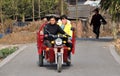 Pengzhou, China: Two Women Riding Motorcycle Cart