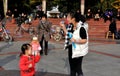 Pengzhou, China: Woman Blowing Bubbles