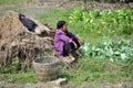 Pengzhou, China: Woman Resting in Field