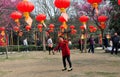 Pengzhou, China: Woman Spinning Top