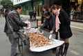 Pengzhou, China: Women Buying Mushrooms