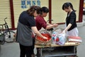 Pengzhou, China: Women Buying Strawberries