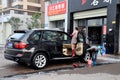 Pengzhou, China: Women Washing Car