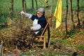 Pengzhou, China: Wooman Sorting Dried Plants