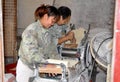 Pengzhou, China: Workers Making Noodle Dough