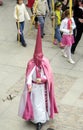 Penitent with censer parading in the Easter Week Procession La Borriquita, Royal Brotherhood of Jesus in his Triumphal Entry into