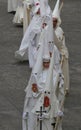 Penitents wait for the start of their Easter holy week in mallorca vertical