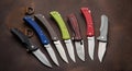 Penknives on a leather back. Folding pocket knives