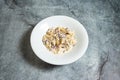 Penne Carbonara with white cream cheese sauce served in plate isolated on background top view of fast food Italian cousin Royalty Free Stock Photo