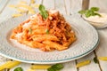 Penne in creamy tomato sauce with sour cream and Voka
