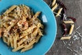 Penne with garlic and oil aglio e olio. Spicy pasta with prawns and cheese