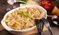 Penne pasta casserole with cheese