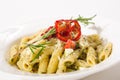 Penne Pasta with cheese feta, spinach, pesto and sun-dried tomatoes Royalty Free Stock Photo