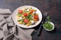 Penne pasta with cherry tomatoes, soft cheese, green beans, spinach and arugula leaves Royalty Free Stock Photo