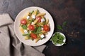 Penne pasta with cherry tomatoes, soft cheese, green beans, spinach and arugula leaves Royalty Free Stock Photo