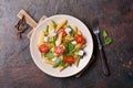 Penne pasta with cherry tomatoes, soft cheese, green beans, spinach and arugula leaves Royalty Free Stock Photo