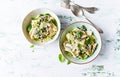 Penne pasta with creamy spinach sauce and parmesan